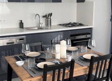 Меблированные двухкомнатные апартаменты, 50м², в комфортабельной новостройке в 500м от моря в районе Кестель, Алания ID-18773 фото-2