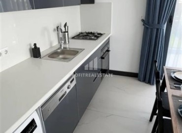 Меблированные двухкомнатные апартаменты, 50м², в комфортабельной новостройке в 500м от моря в районе Кестель, Алания ID-18773 фото-3