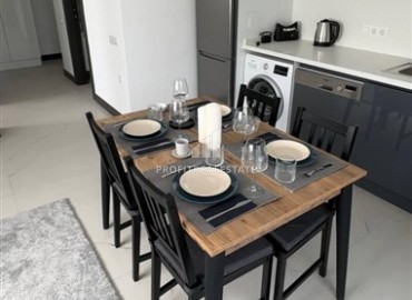 Меблированные двухкомнатные апартаменты, 50м², в комфортабельной новостройке в 500м от моря в районе Кестель, Алания ID-18773 фото-4