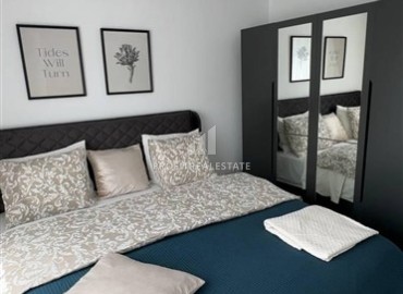 Меблированные двухкомнатные апартаменты, 50м², в комфортабельной новостройке в 500м от моря в районе Кестель, Алания ID-18773 фото-6