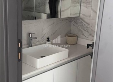 Меблированные двухкомнатные апартаменты, 50м², в комфортабельной новостройке в 500м от моря в районе Кестель, Алания ID-18773 фото-7