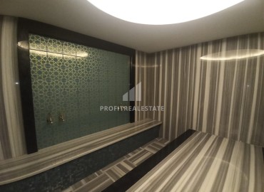 Меблированные двухкомнатные апартаменты, 50м², в комфортабельной новостройке в 500м от моря в районе Кестель, Алания ID-18773 фото-11