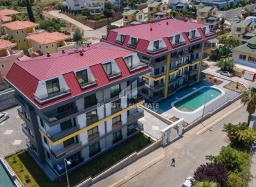 Меблированные двухкомнатные апартаменты, 50м², в комфортабельной новостройке в 500м от моря в районе Кестель, Алания ID-18773 фото-14