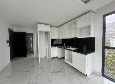 Двухкомнатная квартира, 43,5м², с великолепным видом на горы в новом элитном комплексе в Махмутларе, Алания ID-18776 фото-2