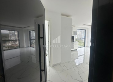 Двухкомнатная квартира, 43,5м², с великолепным видом на горы в новом элитном комплексе в Махмутларе, Алания ID-18776 фото-6