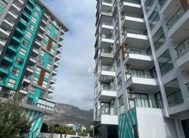 Двухкомнатная квартира, 43,5м², с великолепным видом на горы в новом элитном комплексе в Махмутларе, Алания ID-18776 фото-20