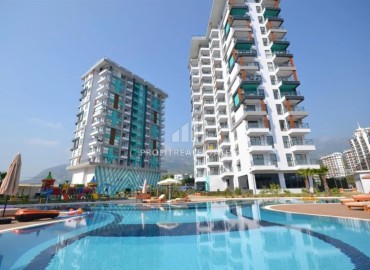 Двухкомнатная квартира, 43,5м², с великолепным видом на горы в новом элитном комплексе в Махмутларе, Алания ID-18776 фото-22