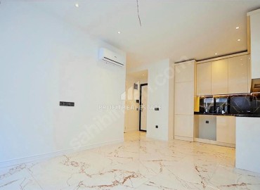 Квартира с одной спальней, 55м², в новом элитном комплексе у подножия гор в районе Алании – Оба ID-18749 фото-2