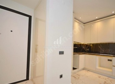 Квартира с одной спальней, 55м², в новом элитном комплексе у подножия гор в районе Алании – Оба ID-18749 фото-11