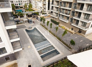 Двухкомнатные апартаменты, 45м², в комплексе 2025 года постройки, с недорогой инфраструктурой в районе Алании - Оба ID-18778 фото-12