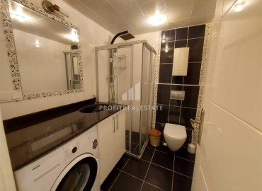 Готовая к проживанию, квартира с одной спальней, 70м², в уютном комплексе с бассейном в 300м от моря в районе Оба, Алания ID-18779 фото-6