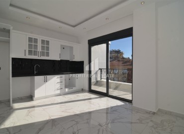 Двухкомнатная квартира, 50м², в новом комплексе с зимним бассейном, с отличной локацией в центре Алании ID-18783 фото-2