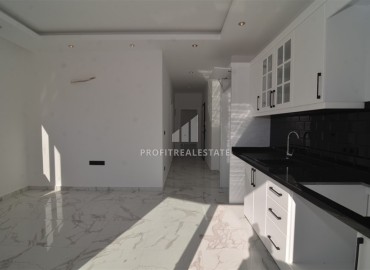Двухкомнатная квартира, 50м², в новом комплексе с зимним бассейном, с отличной локацией в центре Алании ID-18783 фото-3