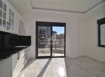 Двухкомнатная квартира, 50м², в новом комплексе с зимним бассейном, с отличной локацией в центре Алании ID-18783 фото-4