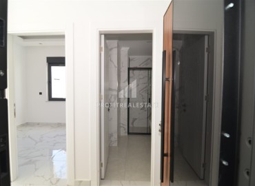 Двухкомнатная квартира, 50м², в новом комплексе с зимним бассейном, с отличной локацией в центре Алании ID-18783 фото-17