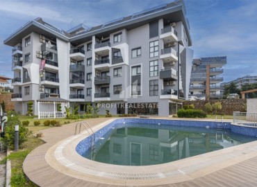 Двухкомнатные апартаменты со стильным интерьером, 50м², в комфортабельном комплексе в районе Оба, Алания ID-18785 фото-1