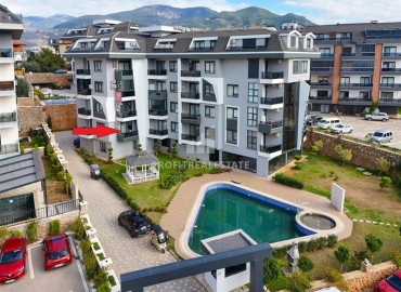 Двухкомнатные апартаменты со стильным интерьером, 50м², в комфортабельном комплексе в районе Оба, Алания ID-18785 фото-12