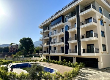 Квартира с одной спальней, 50м², в комфортабельной резиденции с инфраструктурой в районе Оба, Алания ID-18787 фото-1