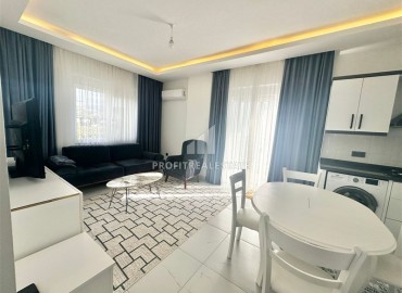 Меблированная двухкомнатная квартира, 61м², в новом комфортабельном комплексе, у моря в Каргыджаке, Алания ID-18797 фото-2