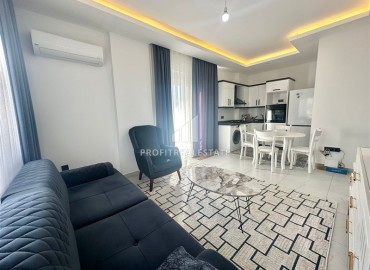 Меблированная двухкомнатная квартира, 61м², в новом комфортабельном комплексе, у моря в Каргыджаке, Алания ID-18797 фото-7