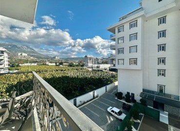 Меблированная двухкомнатная квартира, 61м², в новом комфортабельном комплексе, у моря в Каргыджаке, Алания ID-18797 фото-12