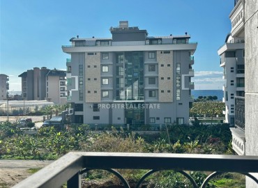 Меблированная двухкомнатная квартира, 61м², в новом комфортабельном комплексе, у моря в Каргыджаке, Алания ID-18797 фото-14