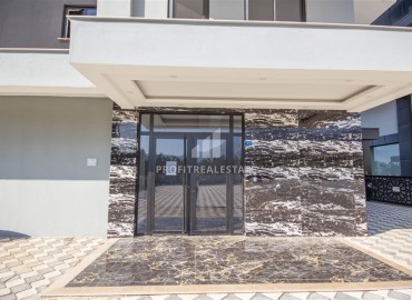 Новые двухкомнатные апартаменты, 55м², с дизайнерским интерьером, в 150м от моря в районе Каргыджак, Алания ID-18801 фото-17