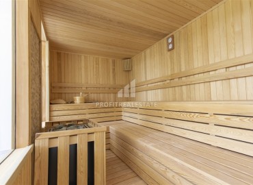 Новые двухкомнатные апартаменты, 55м², с дизайнерским интерьером, в 150м от моря в районе Каргыджак, Алания ID-18801 фото-19