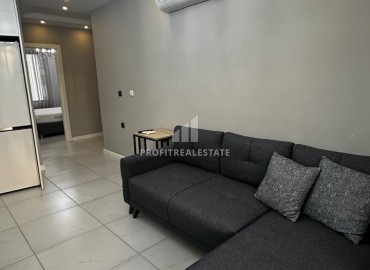 Готовые к проживанию, двухкомнатные апартаменты, 48м², в комплексе с инфраструктурой в районе Алании Тосмур ID-18810 фото-5