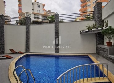 Готовые к проживанию, двухкомнатные апартаменты, 48м², в комплексе с инфраструктурой в районе Алании Тосмур ID-18810 фото-11