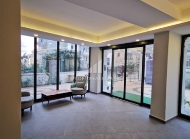 Готовые к проживанию, двухкомнатные апартаменты, 48м², в комплексе с инфраструктурой в районе Алании Тосмур ID-18810 фото-15