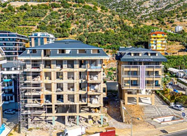 One bedroom apartment, 57m², in a residence at the final stage of construction in the center of Alanya, 550m from Cleopatra Beach ID-16957 фото-1