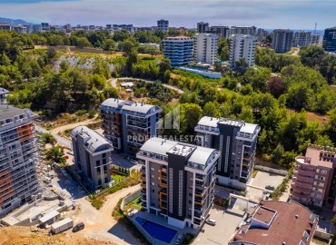Двухкомнатные апартаменты, 45м², в новом комплексе премиум класса в районе Авсаллар, Алания по привлекательной цене ID-18820 фото-1