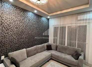 Уютная двухкомнатная квартира, 60м², со стильным интерьером в современном комплексе с отличной локацией в Махмутларе, Алания ID-18825 фото-2