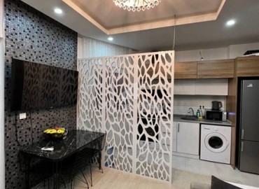 Уютная двухкомнатная квартира, 60м², со стильным интерьером в современном комплексе с отличной локацией в Махмутларе, Алания ID-18825 фото-4