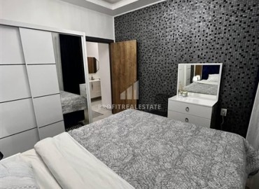 Уютная двухкомнатная квартира, 60м², со стильным интерьером в современном комплексе с отличной локацией в Махмутларе, Алания ID-18825 фото-5