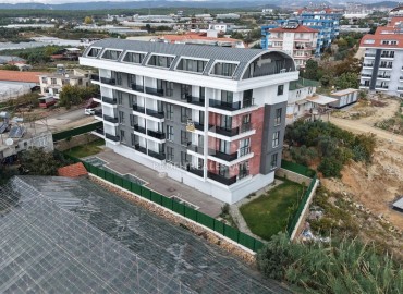 Выгодное предложение: апартаменты с одной спальней, 45м², в новой резиденции с инфраструктурой в районе Алании Паяллар ID-18826 фото-1