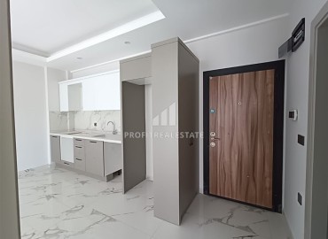 Квартира с одной спальней, 63м², в строящемся комплексе, в 550м от моря в районе Тосмур, Алания ID-14187 фото-6