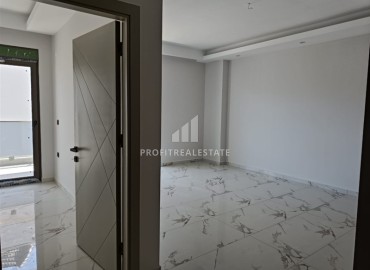 Квартира с одной спальней, 63м², в строящемся комплексе, в 550м от моря в районе Тосмур, Алания ID-14187 фото-8