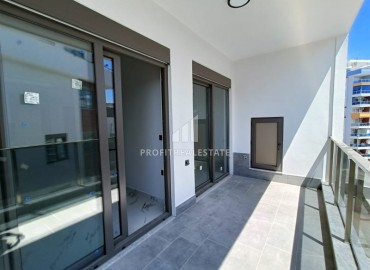 Квартира с одной спальней, 63м², в строящемся комплексе, в 550м от моря в районе Тосмур, Алания ID-14187 фото-13