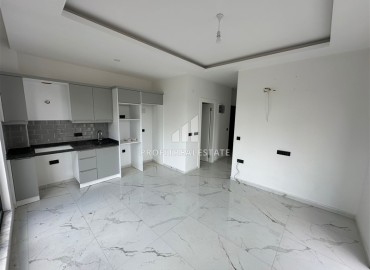 Стильная квартира с одной спальней, 50м², в новом комплексе премиум класса в центре Махмутлара, Алания ID-18262 фото-3