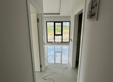 Стильная квартира с одной спальней, 50м², в новом комплексе премиум класса в центре Махмутлара, Алания ID-18262 фото-6