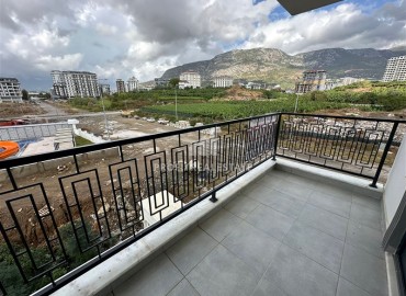 Стильная квартира с одной спальней, 50м², в новом комплексе премиум класса в центре Махмутлара, Алания ID-18262 фото-7