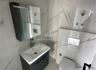 Стильная квартира с одной спальней, 50м², в новом комплексе премиум класса в центре Махмутлара, Алания ID-18262 фото-9