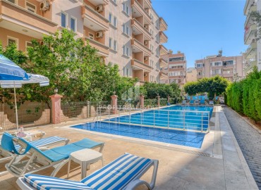 Уютные апартаменты 1+1, 65м², в комфортабельном комплексе с инфраструктурой у вторничного рынка в Махмутларе, Алания ID-18831 фото-1