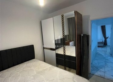 Недорогая квартира с двумя спальнями, 90м², в комплексе с бассейном в Махмутларе, Алания ID-18833 фото-9
