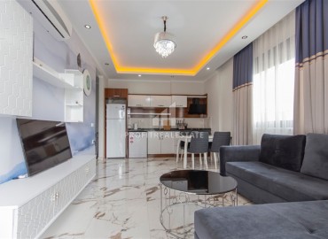 Стильные апартаменты 1+1 с дизайнерским интерьером, 55м², в комплексе премиум класса в Махмутларе, Алания ID-18835 фото-2