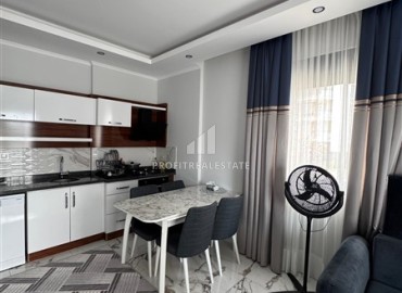 Стильные апартаменты 1+1 с дизайнерским интерьером, 55м², в комплексе премиум класса в Махмутларе, Алания ID-18835 фото-6