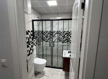 Стильные апартаменты 1+1 с дизайнерским интерьером, 55м², в комплексе премиум класса в Махмутларе, Алания ID-18835 фото-11