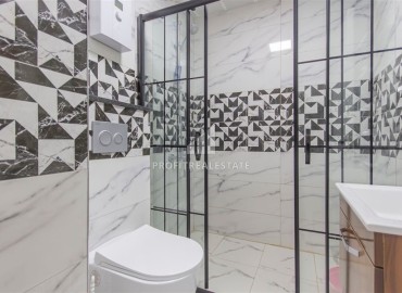 Стильные апартаменты 1+1 с дизайнерским интерьером, 55м², в комплексе премиум класса в Махмутларе, Алания ID-18835 фото-12